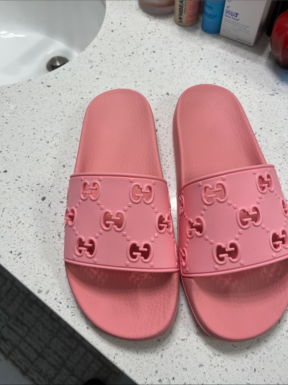 Gucci Pink GG Embossed Rubber Slide Sandals